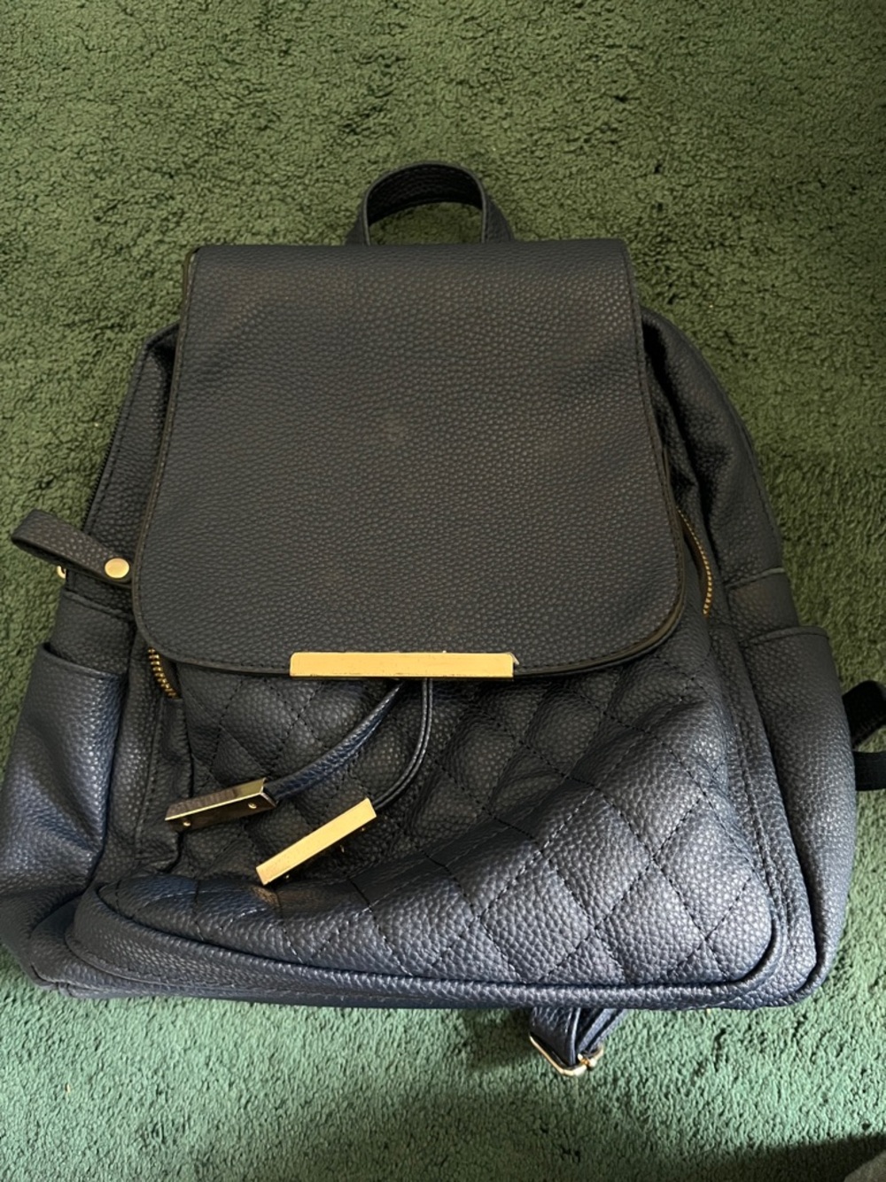 Quilted navy blue Backpack with Gold Hardware